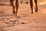Men running on the beach