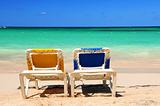 Chairs on sandy beach