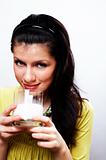 young beautiful causacian woman with glass of milk