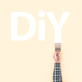 Decorator painting DIY on a wall