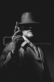 Agent with a revolver