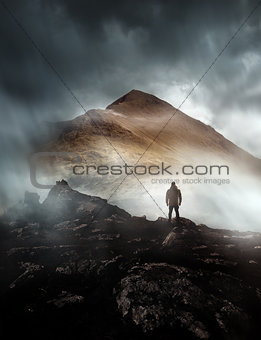 Man Hiking On A Misty Mountain