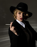businesswoman with cigarette on a dark background, stylized retro portrait