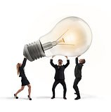 Business people hold a light bulb. concept of new idea and company startup