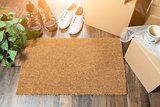 Home Sweet Home Welcome Mat, Moving Boxes, Women and Male Shoes 