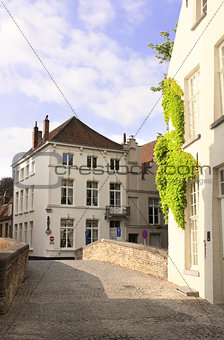Street with historic medieval buildings, Bruges, Belgium