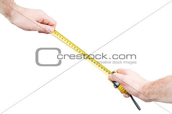 Man makes a measuring tape measure