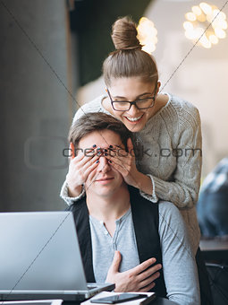 Girlfriend making her boyfriend surprise and closing eyes