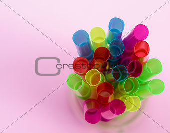 multi-colored plastic tubes for a cocktail