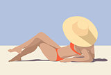 Girl in the hat on the sunny beach sunbathing