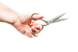 Large scissors in male hand