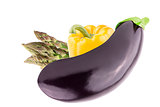 Fresh eggplant, green asparagus and sweet peppers bell over whit