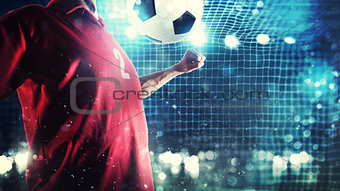 Striker player controls the ball near the football goal
