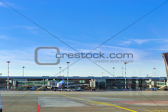 Airplane at stationary terminal gates airport Riga