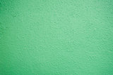 pastel green plastered wall texture background
