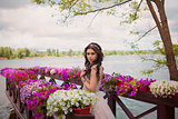 young beautiful bride woman in white dress outdoors on the nature