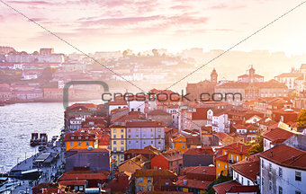 Antique town Porto Portugal. Sunset sun