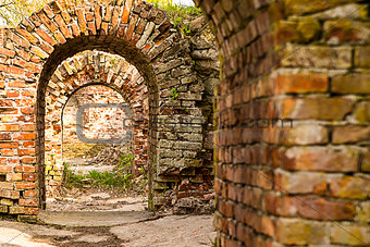 study of the old fortress of the catacombs brick ruined arch of a series of broken portal dangerous walk