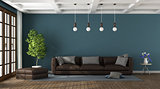 Brown sofa in a blue living room