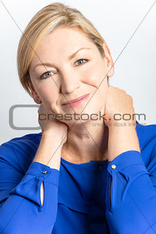 Studio Portrait of Healthy Happy Middle Aged Woman 