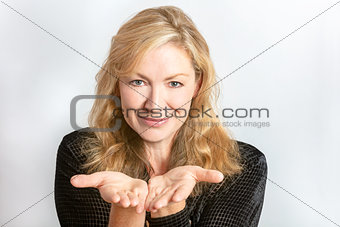 Studio Portrait of Healthy Happy Middle Aged Woman Hands Out