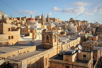 Panoramic view over the Grand Harbour hotel in Valletta, Malta . Bell tower of Santa Marija ta' Gesu Church