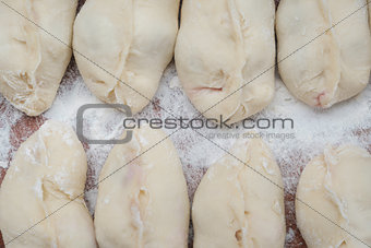 Vareniki, dumplings on wooden board, traditional Ukrainian and R