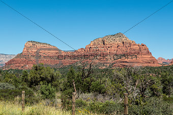 View of Twin Buttes with Chapel of the Holy Cross from Red Rock Scenic Byway in Sedona, Arizona