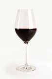 Glass of red wine isolated on white