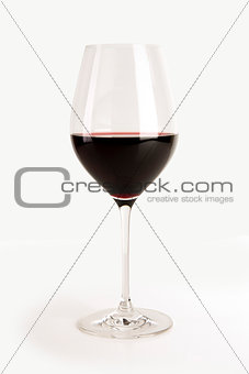 Glass of red wine isolated on white