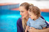 Mother with son near pool