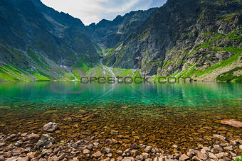 a cold picturesque mountain lake  Czarny Staw in the high Tatra 