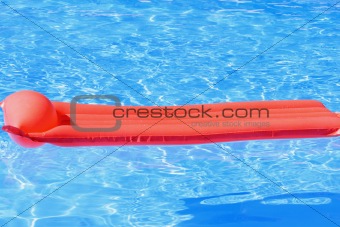 Inflatable mattress in pool