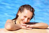 Smiling woman in the pool