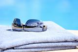 Sunglasses on towel