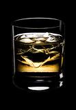 Glass of whisky on a black background