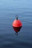 plastic buoy on the blue water