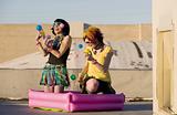 Punk Girls Juggling Plastic Balls