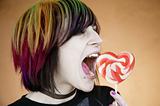Alternative Girl Eating a Heart Lollipop