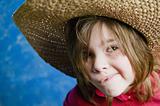Little girl with a straw hat
