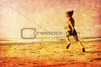 Child running on a beach