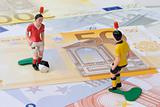 Figures of football players on banknotes