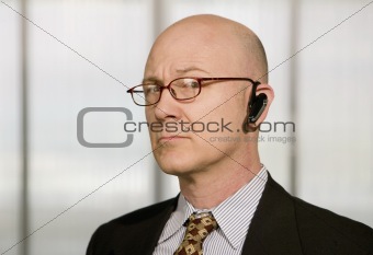 Businessman with a hands-free phone