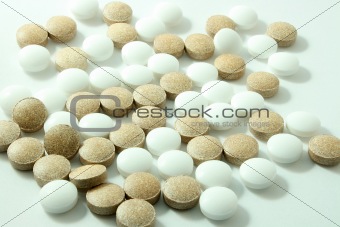 Mix of Brown and White Pills 