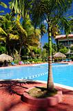Swimming pool hotel at tropical resort