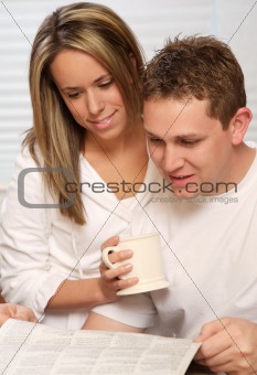 young couple on a kitchen