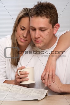 young couple on a kitchen