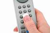female hand with remote control
