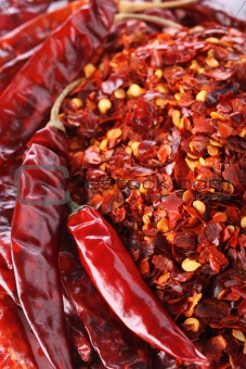 Hot Red Chilli Chillies pepper whole and crushed Background 