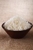 plain white rice bowl  on brown rustic background